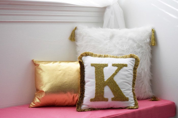 Get out your sewing machine and update your home decor with a passel of pretty, fancy shmancy DIY pillows. Perfect for a girl's bedroom.