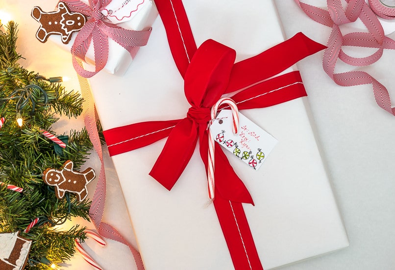 This sweet gift wrapping uses cinnamon-applesauce dough and candy canes to tell the recipients of your gifts that they are special to you. 