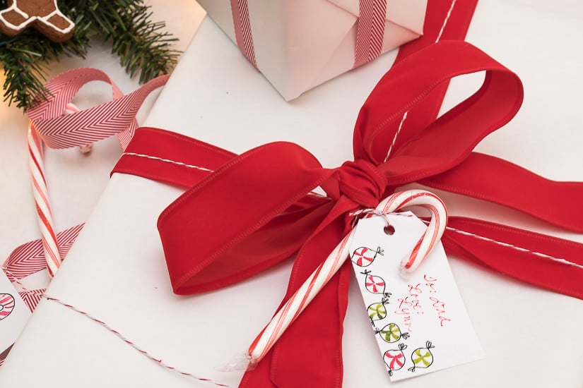 This sweet gift wrapping uses cinnamon-applesauce dough and candy canes to tell the recipients of your gifts that they are special to you. 