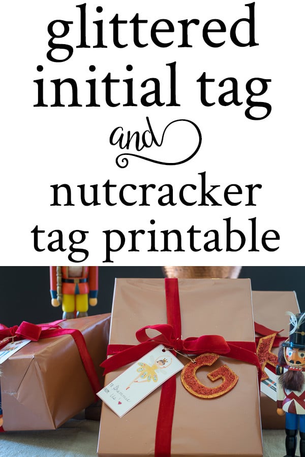 presents wrapped in copper and glittered initial tag